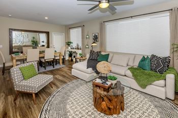 Living room with sofa and coffee table at Level 25 at Sunset by Picerne, Las Vegas, NV